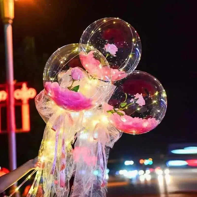 Bouquet de roses lumineuses LED dans ballon transparent Fééries Mancelya
